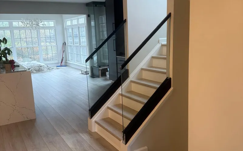 Frameless glass stair railing installed in a Los Angeles home