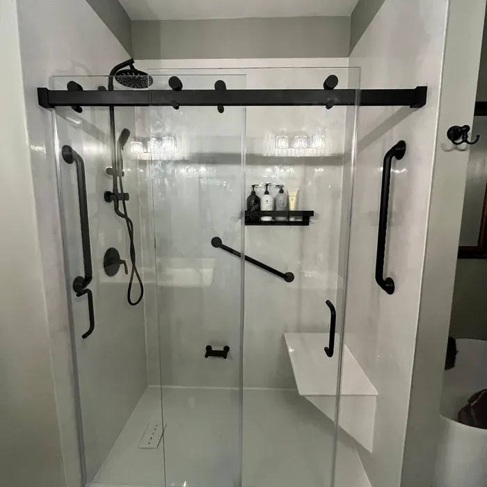 Frameless glass shower door in a modern bathroom